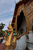 Chiang Mai - The Wat Phra Singh temple. The Viharn Luang (main prayer hall) The Makkara-Naga shaped Guardians at the back side portico are copies of those at the main entrance. 